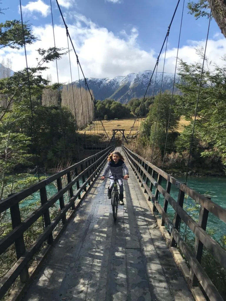 Child on a bike ride at PATA Lodge, Patagonia